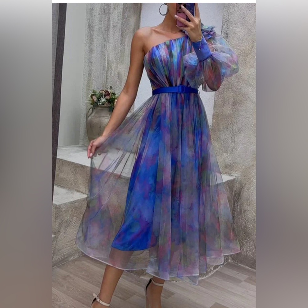 Blue dress with watercolor shear overlay. One sleeve.